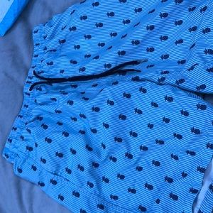 Blue pineapple swim shorts